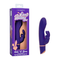 CalExotics Love Bunny Rattle and Bunny massager shown next to its purple retail packaging box on a white background.