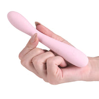 lilac curved g spot vibrator held in hand