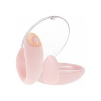 Pink vibrator with charging case on a white background