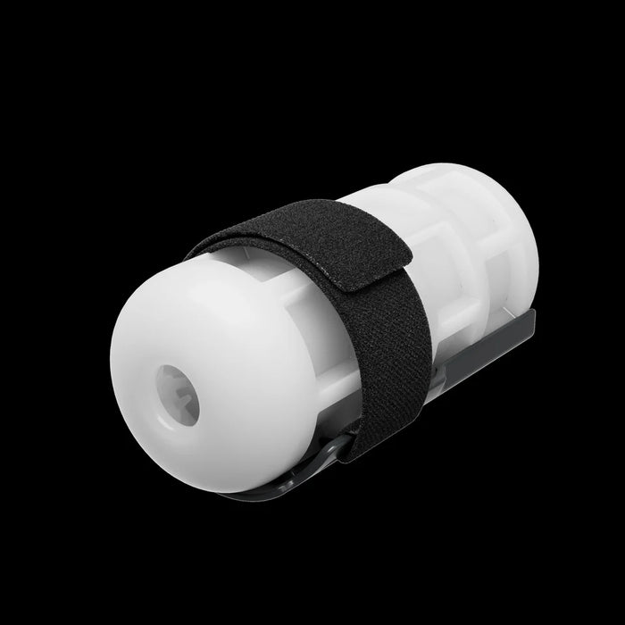 A white cylindrical plastic device with a black elastic strap, shown at an angle on a solid black background.