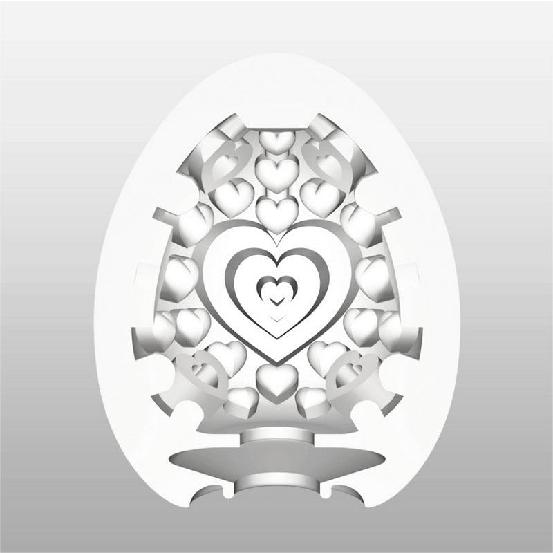white egg shaped masturbator with heart shaped interior