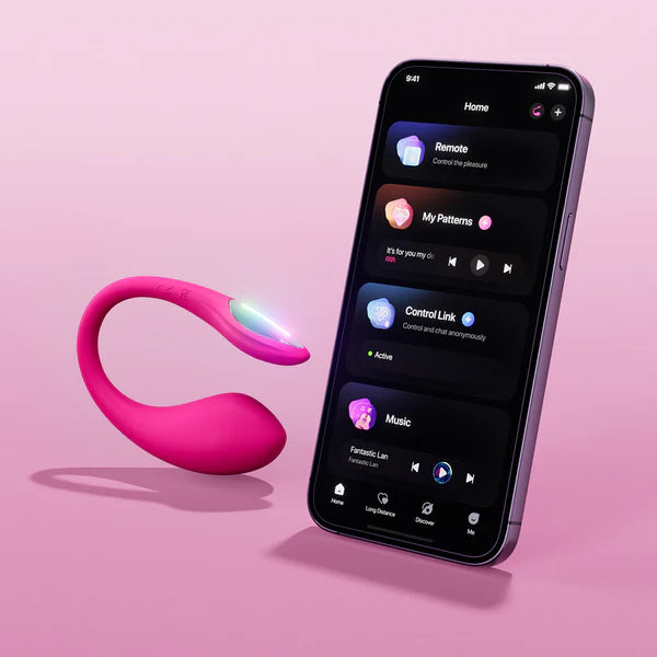Pink lovense vibrator with a smartphone displaying app interface on a pink background