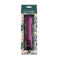 Purple cadence trusting vibrator in floral packaging with 'Lust N Dreams' branding.