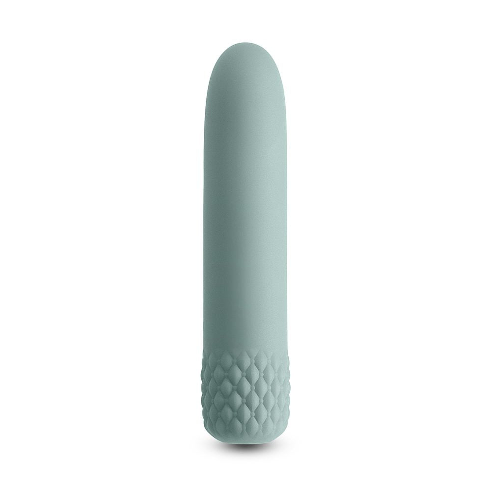 Sleek, sage vibrator with pillowy bottom on a white background