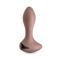 Brown silicone butt plug on a white background