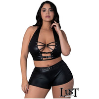 plus size female wearing - Glossy four-way stretch wet look top with adjustable buckles over the plunging front, decorative strappy elastics over soft cups and a halter tie-neck collar
- Sleek mini shirt with a wide waistband, in black, front view