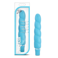 blue ribbed vibrator beside box