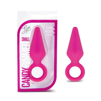 pink anal plug with finger ring holder beside box packaging