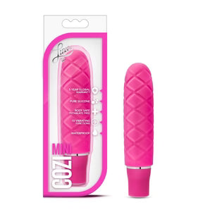 pillow top design mini vibrator in pink, beside box packaging