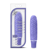 pillow top design mini vibrator in purple, beside box packaging