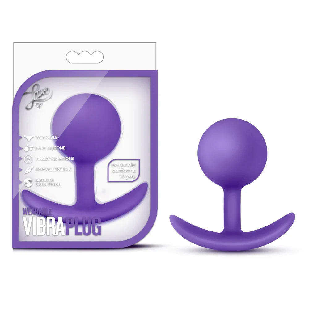 Luxe Wearable Vibra Plug by Blush featuring a smooth rounded shape, flexible EZ-handle base that conforms to the body, pure silicone construction, and tingly vibrations for comfortable wearable stimulation.