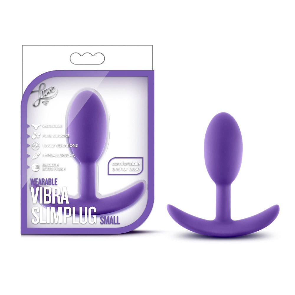 Purple wearable vibra slimplug with packaging on a white background