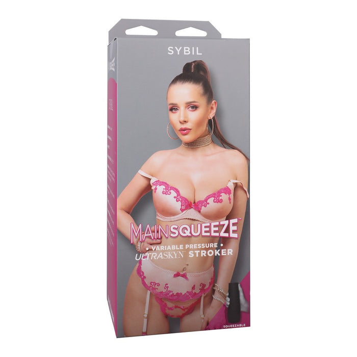 adult star sybil wearing pink & peach bra, panty and garter set on box packaging