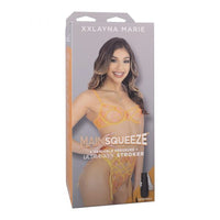 adult star xxalyna marie wearing yellow bra, panty and garter set on box packaging