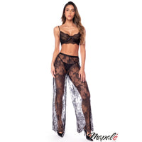 A model wearing a black lace lingerie set consisting of a bralette and sheer wide-leg pants, photographed against a solid white background with a 'Maple' brand watermark in the bottom right corner.