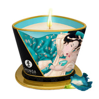 Shunga candle with artistic design on a white background. island bloom scent