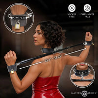 Woman wearing a leather collar and cuffs with measurement details, featuring Master Series branding.