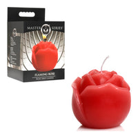 Red rose-shaped candle with packaging on a white background