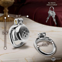Metal chastity cage device with keys on a decorative surface