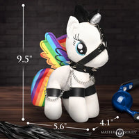Plush toy unicorn with rainbow elements and measurements on a dark background
