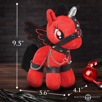 Red plush toy with black accents and measurements on a dark background