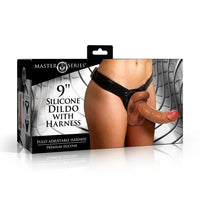 Box of 9-inch silicone dildo with harness by Master Series on a white background