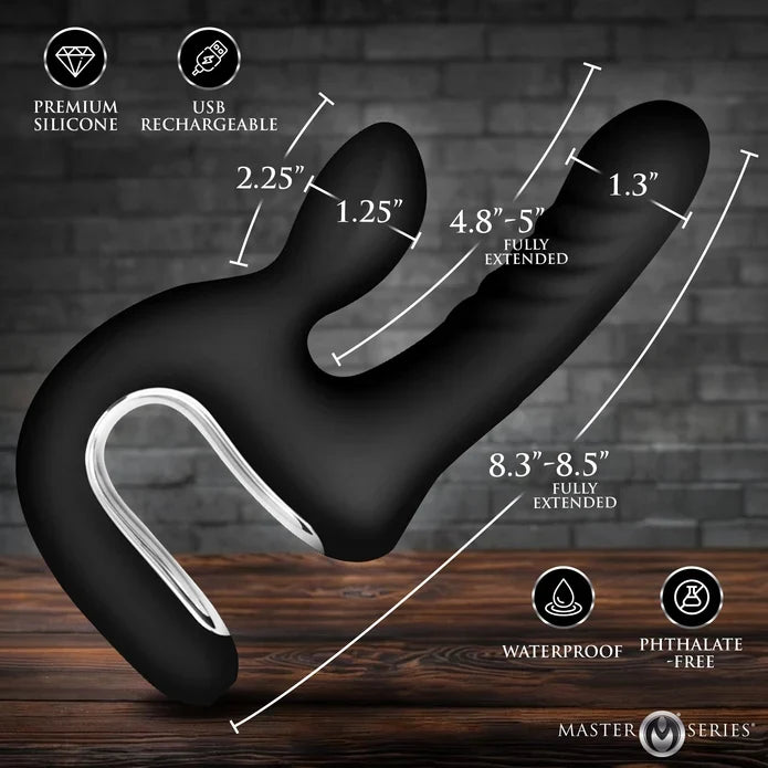 Black silicone dual-stimulation vibrator with dimension callouts showing fully extended lengths, set against a dark brick wall and wooden surface background.