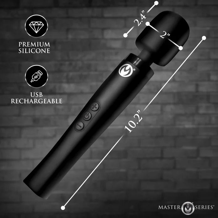 Black wand device with measurements and features on a dark brick wall background