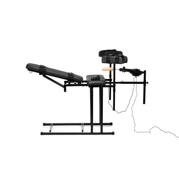 Black massage table with sex machine attachments on a white background