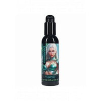 A black bottle of ayla forest warrior lubricant, featuring a label with an illustration of a woman with long white hair and teal armor.