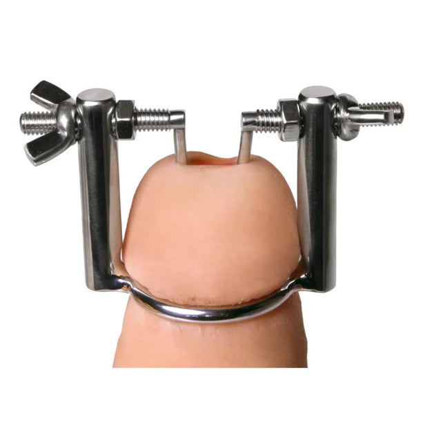 metal spreader that goes over the penis head and spreads the opening
