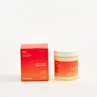 Candle and packaging with 'Câte Ouest West Coast' branding on a white background