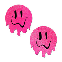 melted smiley face pasties in pink