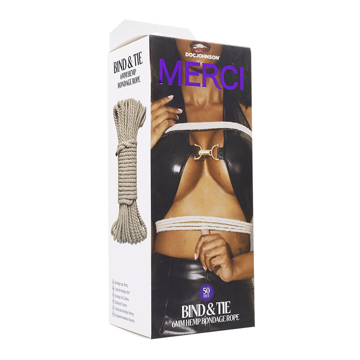 female wearing black leather with hemp rope wrapped around body on box cover