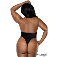 Person wearing a black bodysuit with 'Dreamgirl' branding on a white background