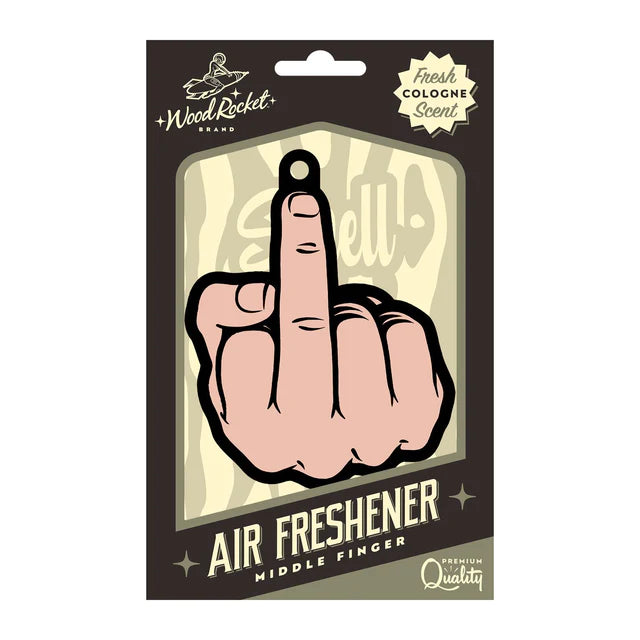 Packaged 'Middle Finger' cardboard air freshener with a pink and black design, extending a middle finger, displayed on a beige and brown card with the brand Wood Rocket visible.
