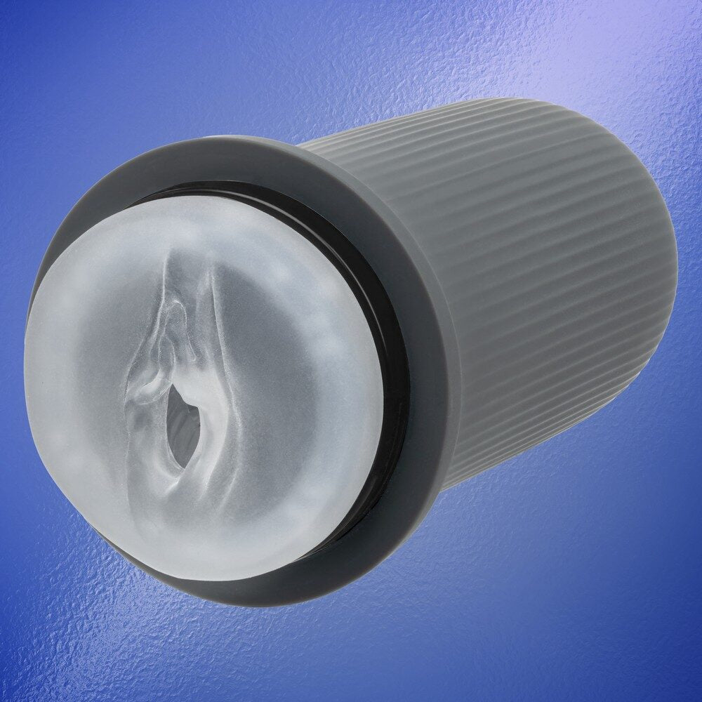 grey and clear vagina masturbator on blue back ground