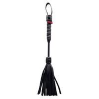 Black leather flogger with a handle on a white background