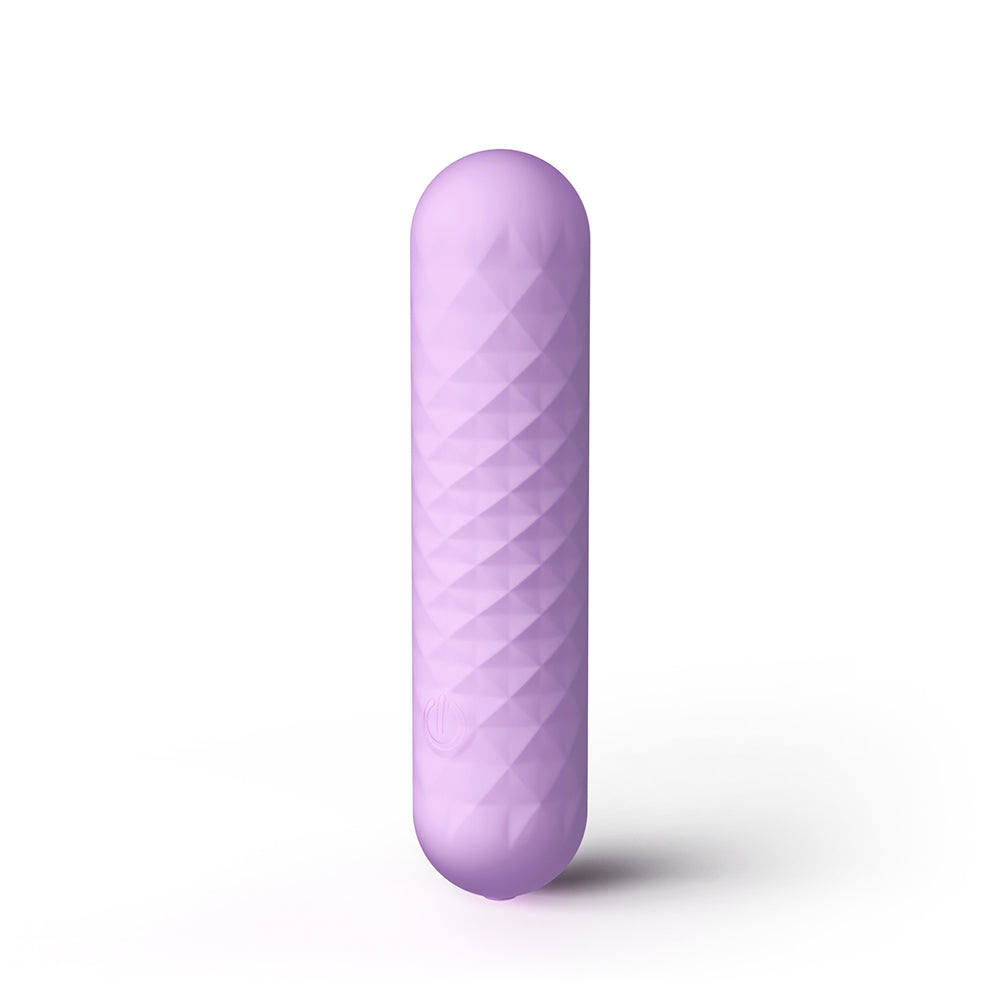 A lavender purple textured silicone personal massager with a rounded, elongated cylindrical shape, standing vertically on a white background with a soft shadow.