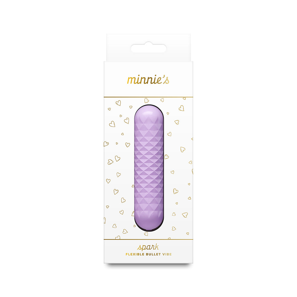 A packaged purple textured bullet vibrator in a white box with gold lettering and heart patterns, labeled 'minnie's spark'.