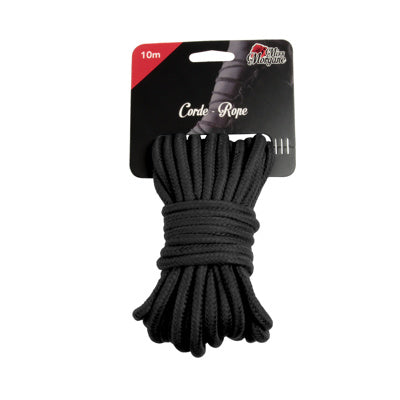 black bondage rope on cardboard card