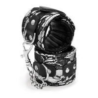 silver handcuffs with black lace