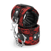 red handcuffs with black lace