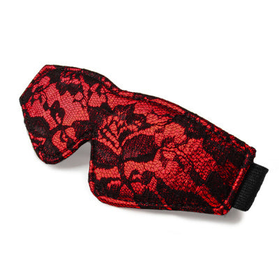 Red and black patterned eye mask product on a white background