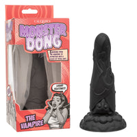 black dildo with a bat wrapped in his wings upside down, with bottom base, beside box packaging
