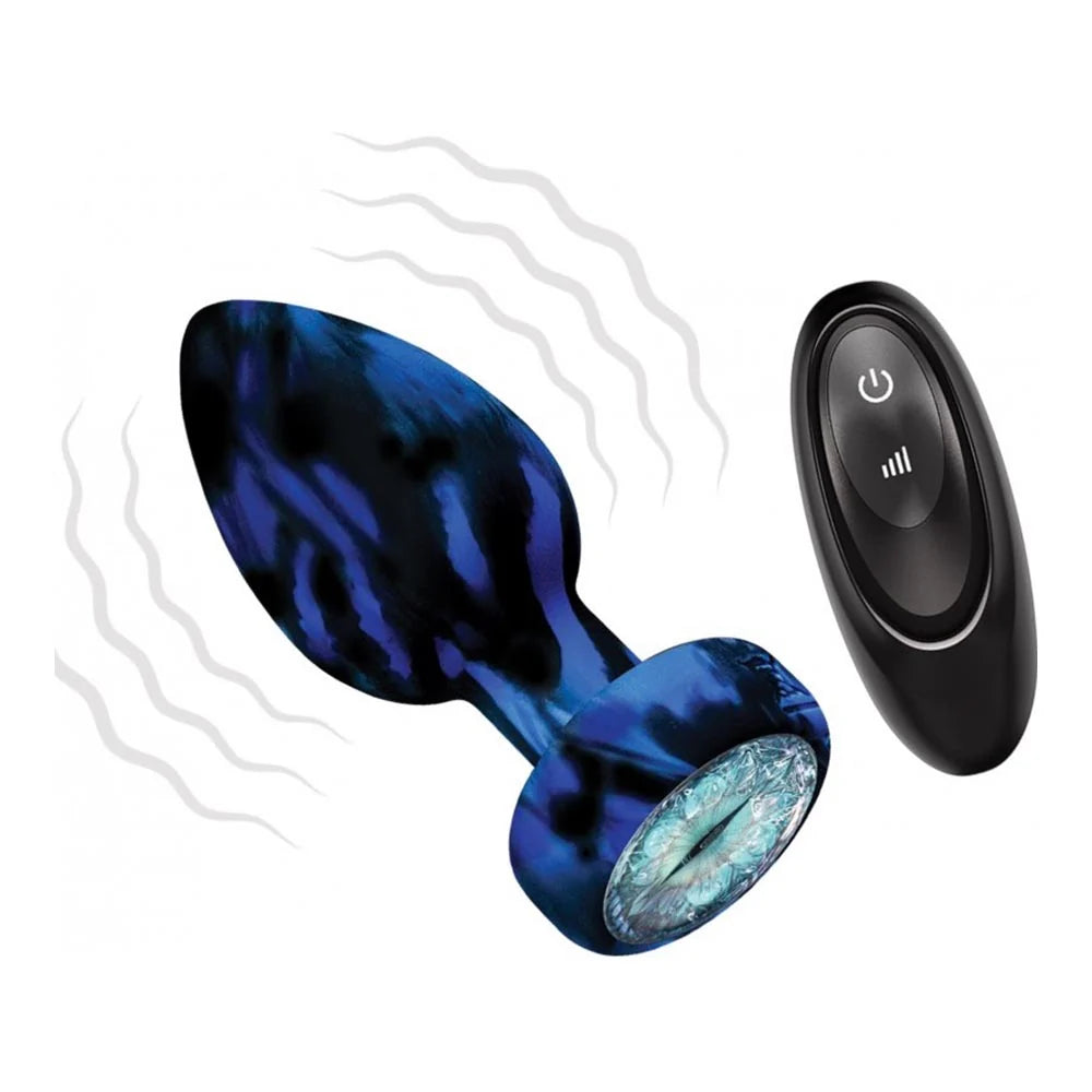 A blue marbled adult novelty device with a round textured base shown next to a black oval remote control on a white background with motion lines.