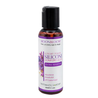 Silicone lubricant bottle with purple label on a white background