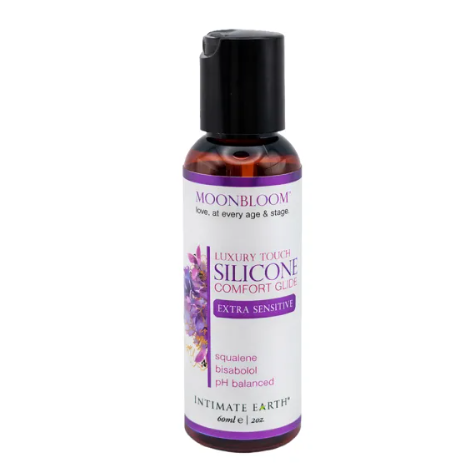 Silicone lubricant bottle with purple label on a white background