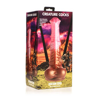 Multi colored centaur creature cock dildo inside packaging.
