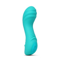 Turquoise muse silicone massager on a white background